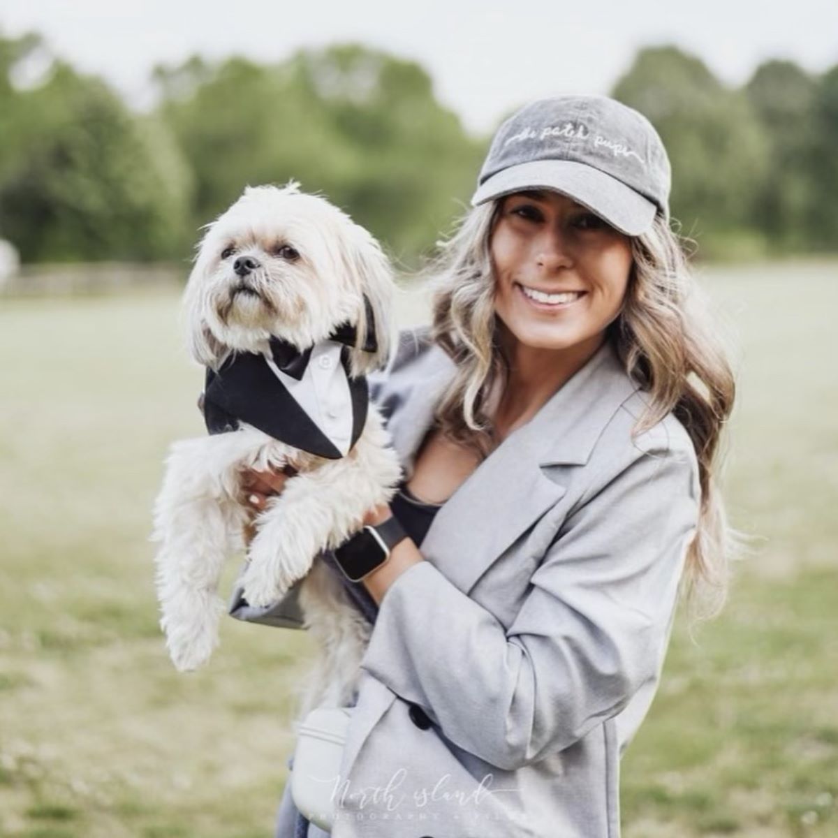 image of caitlyn on beach with dogs